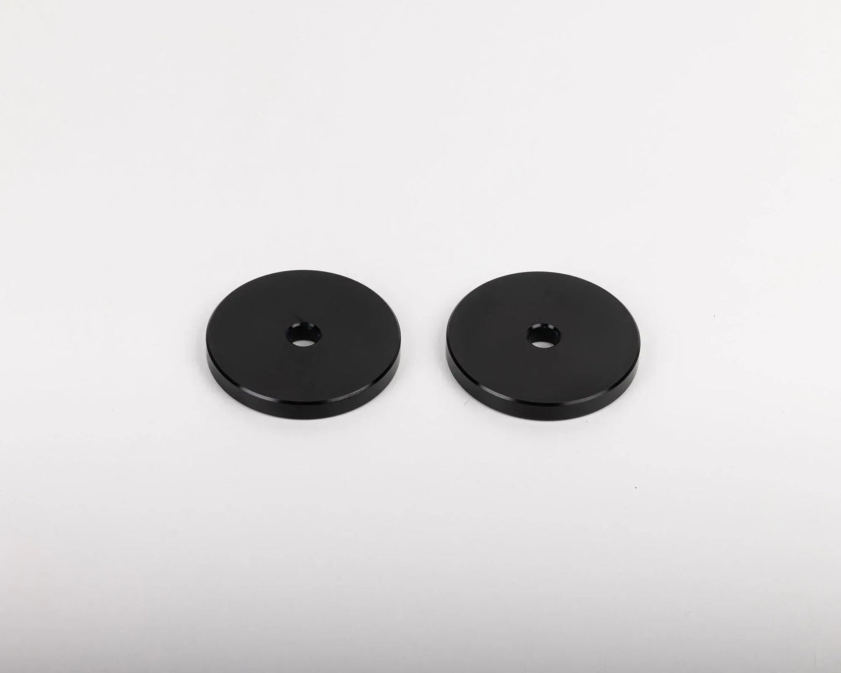 Pair of round black IRONMAN 4x4 front bumper spacers for Ford Ranger