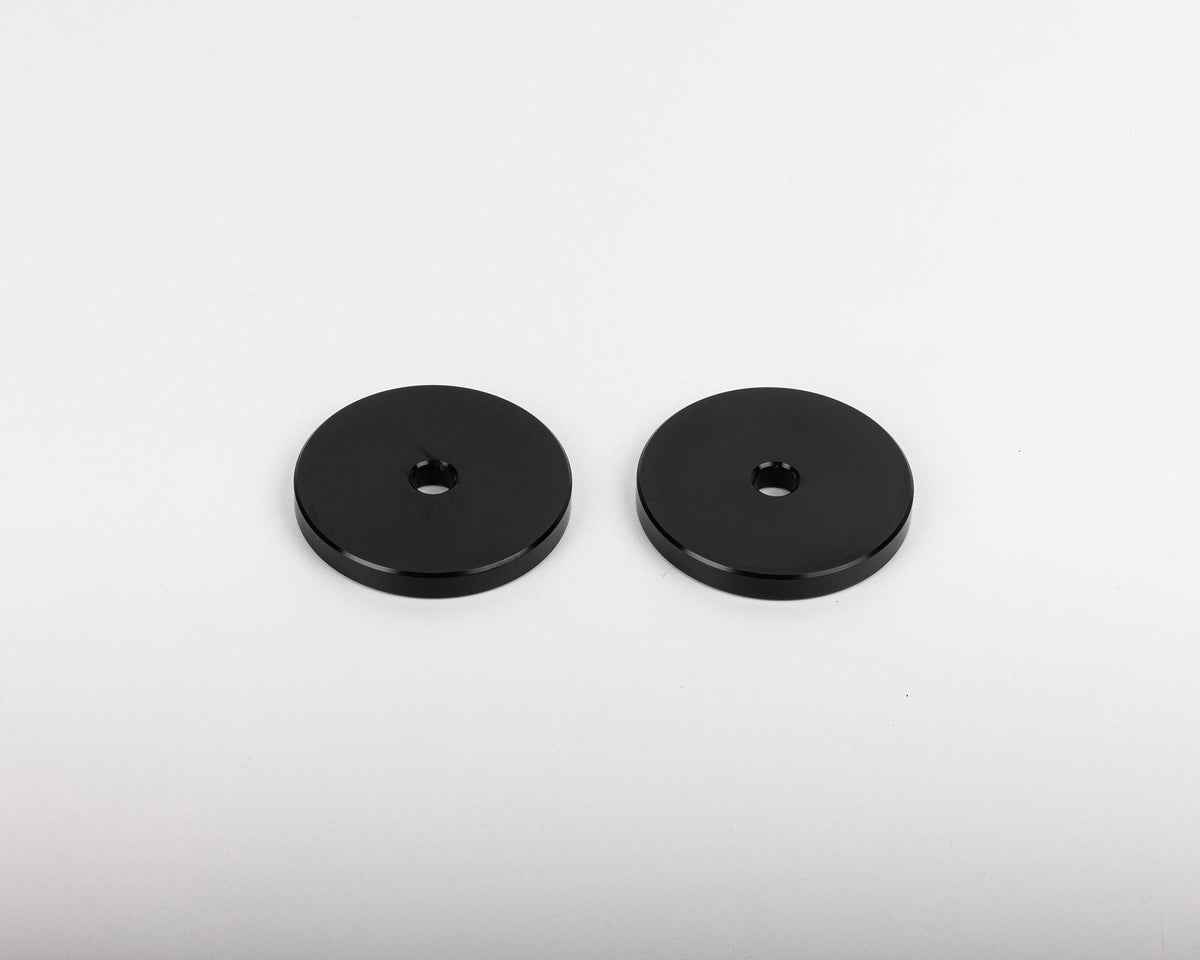 Pair of round black IRONMAN 4x4 front bumper spacers for Toyota Hilux Travo