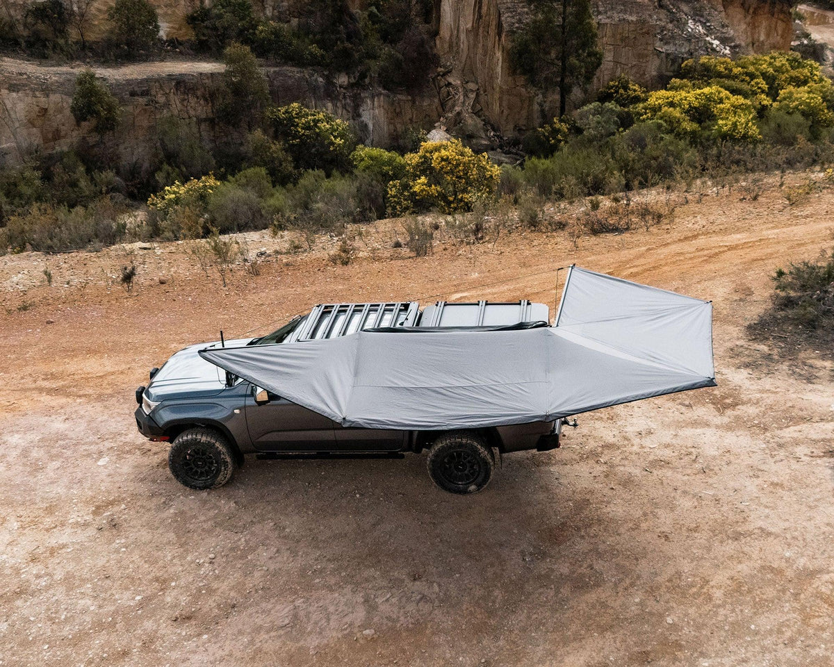 Deltawing 270 degree XL awning open on a 4x4 at a clifftop campsite