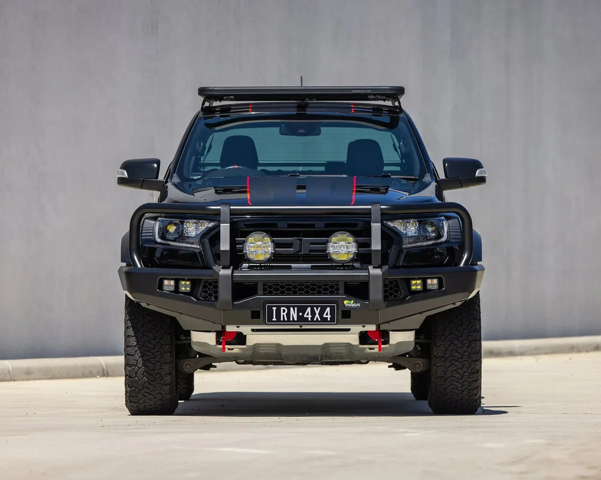 IRONMAN 4x4 APEX bull bar fitted to a Ford Ranger Raptor with driving lights and roof rack