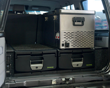 IRONMAN 4x4 full height drawers with a fridge on top in a Toyota Land Cruiser 76