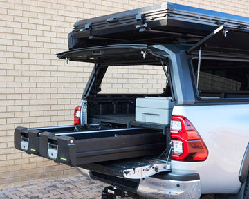 IRONMAN 4x4 roller drawers with the slide extended from a bakkie canopy