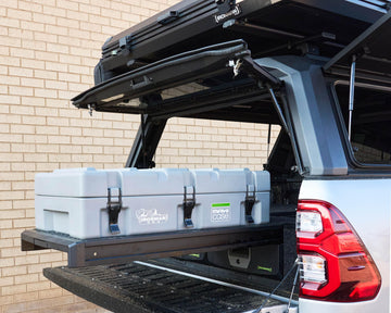 Grey IRONMAN 4x4 Maxi-Case on an extended drawer slide in a bakkie canopy