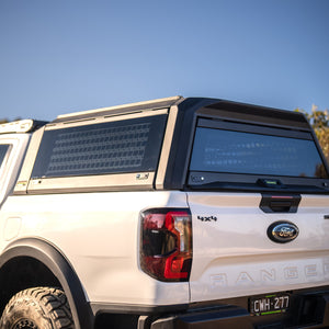 RAID canopy with side windows fitted to a white Ford Ranger Next Gen