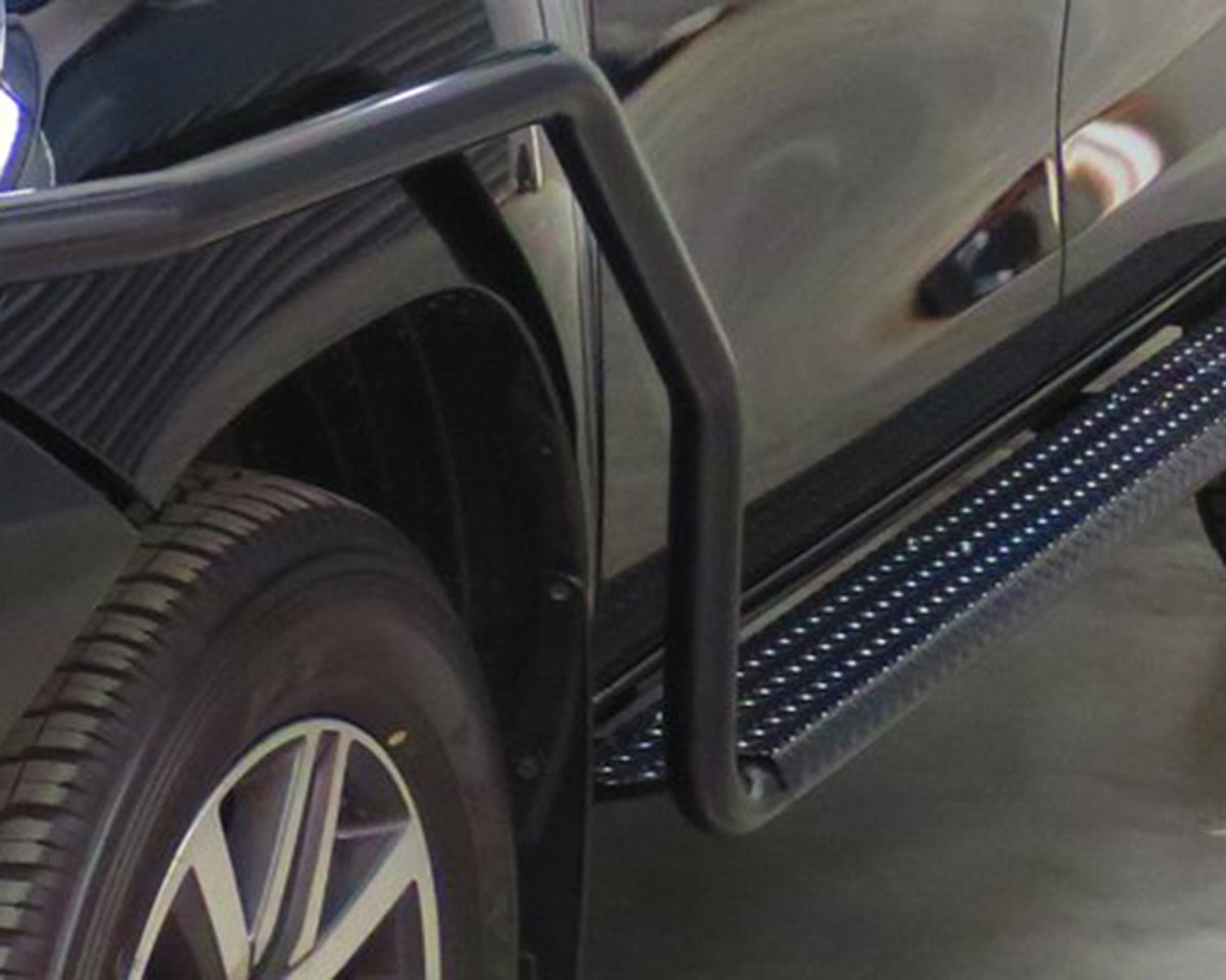 IRONMAN 4x4 side steps and rails fitted to a Mazda BT-50