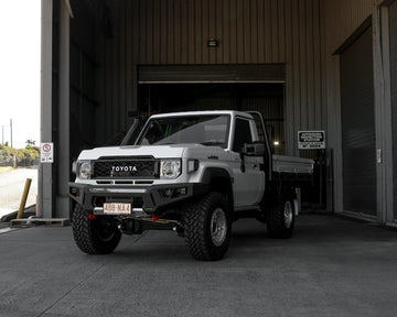 IRONMAN 4x4 RAID bull bar fitted to a white Toyota Land Cruiser 79 single cab