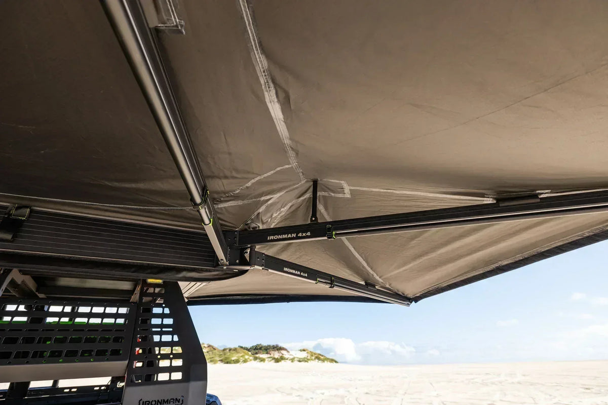 Underside of the Deltawing 270 degree awning frame and fabric