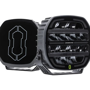 Pair of IRONMAN 4x4 Scope NEO 7 inch driving lights, one with black cover fitted