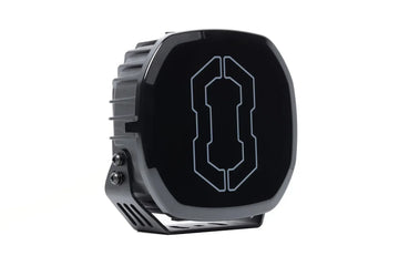 IRONMAN 4x4 Scope NEO 7 inch driving light with black cover, angled view
