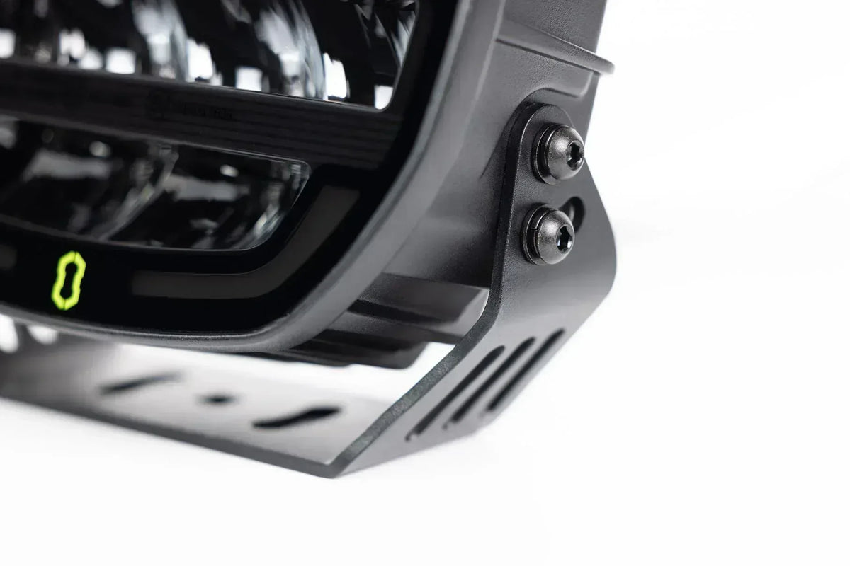 Close-up of the mounting bracket and logo on the IRONMAN 4x4 Scope NEO 7 inch driving light