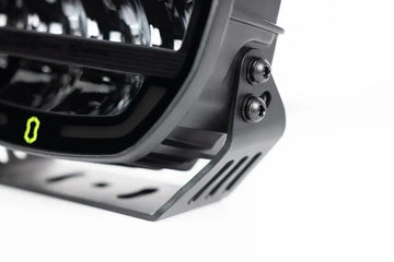 Close-up of the mounting bracket and logo on the IRONMAN 4x4 Scope NEO 7 inch driving light