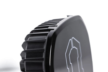 Close-up of the black cover and heat sink on the IRONMAN 4x4 Scope NEO 9 inch driving light