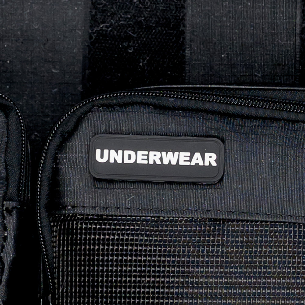 Close-up of the Underwear label on an XPLR Duffel packing cube