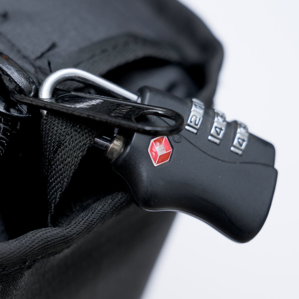 Combination lock on the zip of the XPLR Duffel travel bag