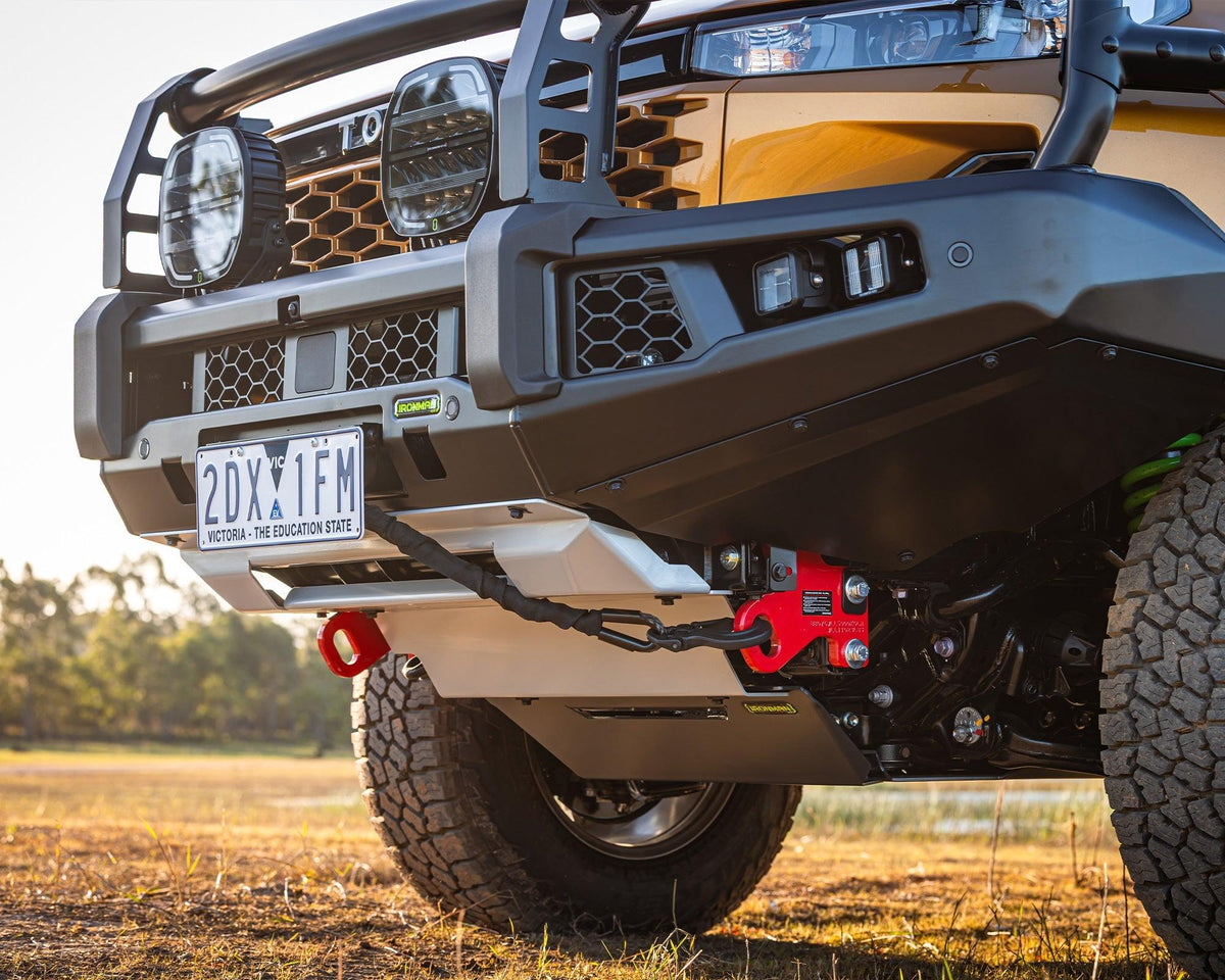 IRONMAN 4x4 APEX bull bar fitted to a Toyota Hilux Travo, close-up of the red recovery points