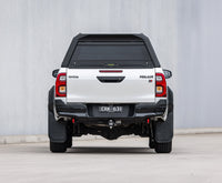 RAID canopy fitted to a white Toyota Hilux, rear view