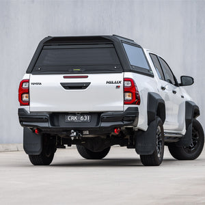 RAID canopy fitted to a white Toyota Hilux, rear three-quarter view