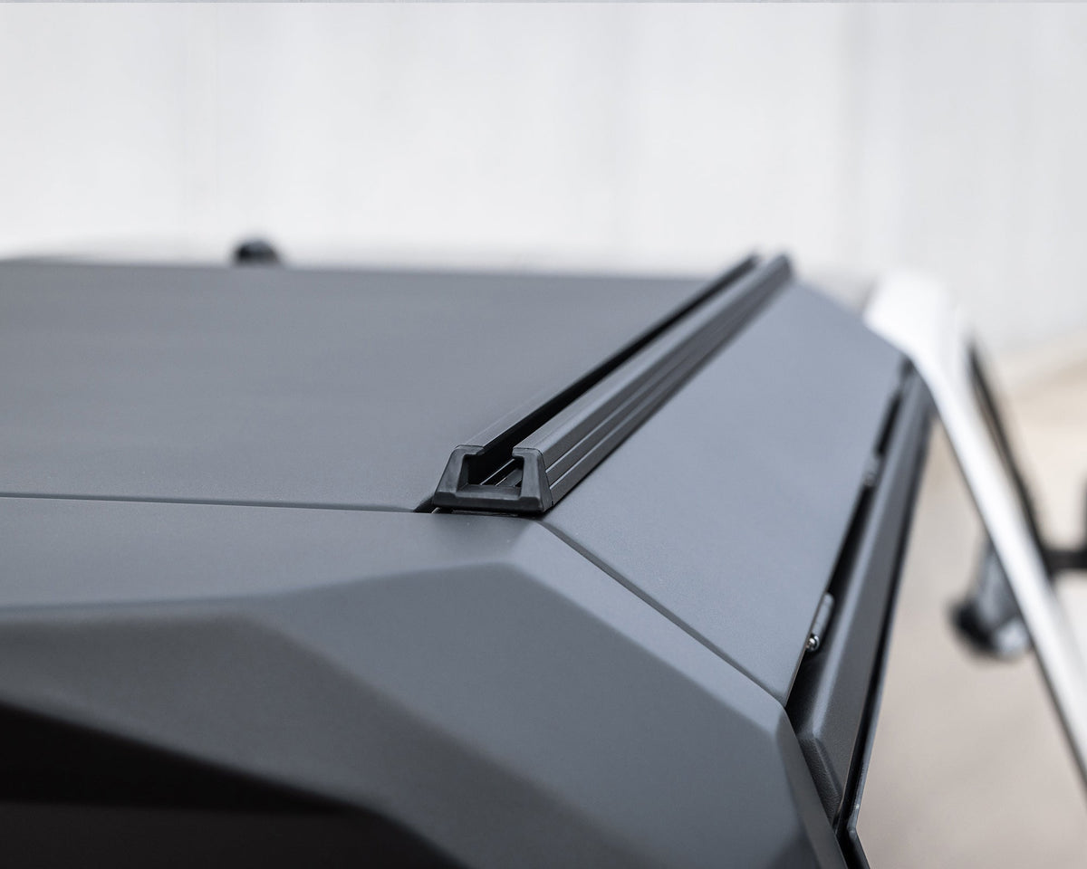 Close-up of the roof rail and corner of a RAID Full Glass canopy